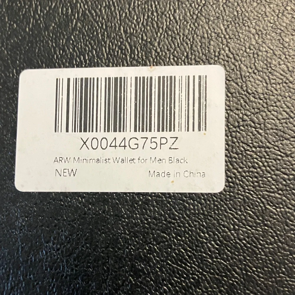 New Black Wallet with Silver Tool